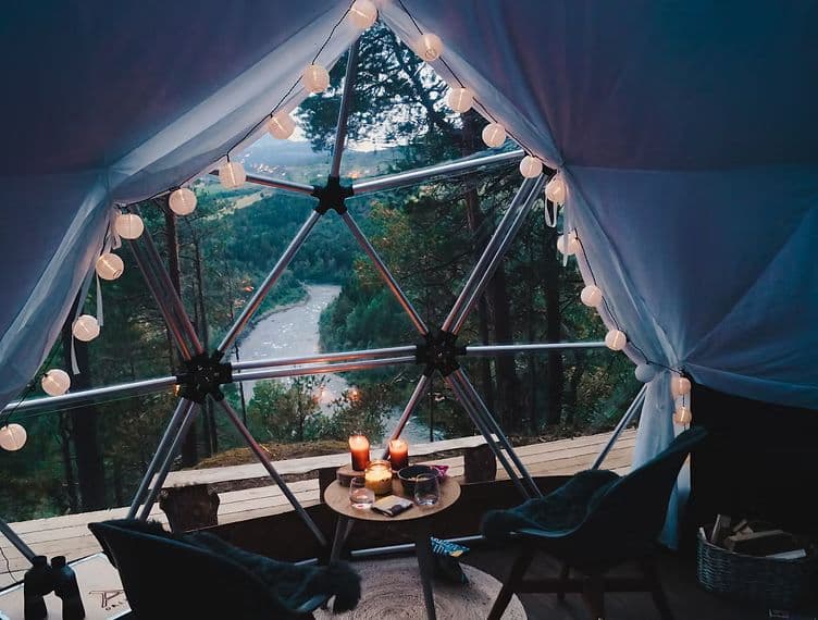A beautiful glamping dome by a river in the Norwegian wilderness