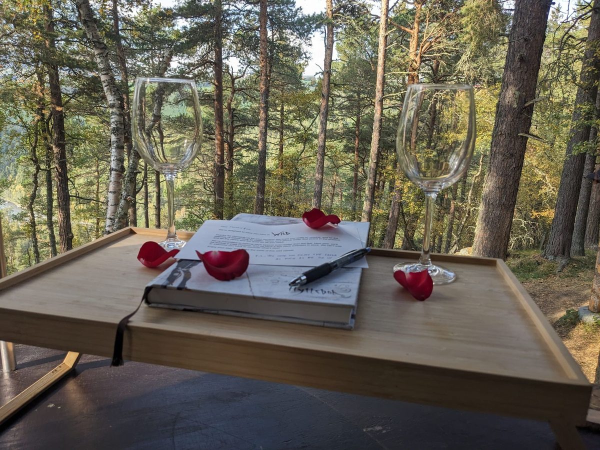 Welcome kit with a handwritten welcome letter at Wild River Glamping